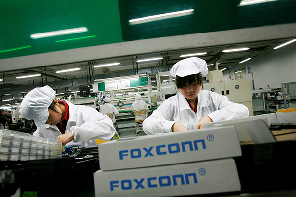 De grutste iPhone-fabryk fan 'e wrâld yn Zhengzhou hastich om wer te hieren om oan hege fraach te foldwaan